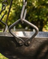 The Kadai Cooking Bowl with Hanging Chains Showing the Bowl Hooked onto the Chains - Digital Illustration