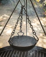 The Kadai Cooking Bowl with Hanging Chains Showing the Empty Bowl over a Fire Pit - Digital Illustration