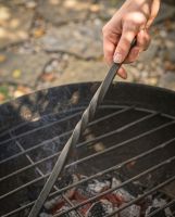 The Kadai Hand-Forged Iron Cooking Fork with Ring Handle Showing a Close up of the Decorative Central Twist - Digital Illustration