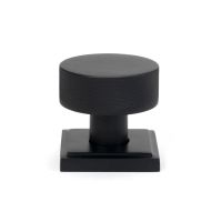 The Knurled Mortice/Rim Knob Set on a Square Rose in Matt Black Shown Upright on a White Background The Knurled Mortice/Rim Knob Set on a Square Rose in Matt Black Shown Upright on a White Background