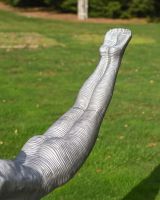 The Leap of Faith Contemporary Garden Statue Showing a Close up of the Feet and Legs