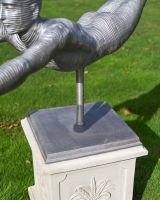 The Leap of Faith Contemporary Garden Statue Showing a Close up of the Square Base