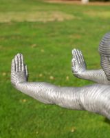 The Leap of Faith Contemporary Garden Statue Showing the Ribbed Arms Stretched Out