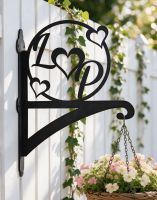 The Love Heart Initial Iron Hanging Basket Bracket Mounted on a White Painted Wooden Fence - Digital Illustration
