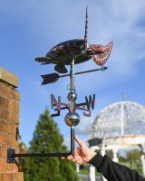 The Mariner’s Reach Sea Turtle Verdigris Copper Weathervane Shown with Hand in Shot for Scale