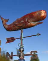 The Moby the Whale Verdigris Copper Weathervane Shown Up Close from a Low Angle