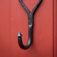 The Open Heart Iron Coat Hook 125mm Showing a Close up of the Pointed Hook and Attachment Point - Digital Illustration