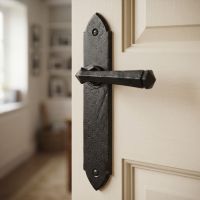 The Orelia Square Cast Iron Lever Handle on a White Door to a Modern Living Room - Digital Illustration