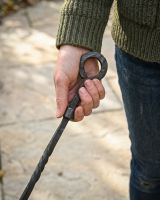 The “Pearson Place” Wrought Iron Fireside Poker Showing a Someone Gripping the Handle - Digital Illustration