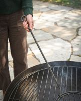 The “Pearson Place” Wrought Iron Fireside Poker Shown Being used Outside on a Kadai Firebowl - Digital Illustration