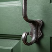 The Schoolhouse Heavy Duty Cast Iron Coat Hook Showing a Close up of the Lower Hook and Backplate - Digital Illustration