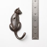 The Seated Cat Antique Iron Coat Hook - 125mm On a White Background  with a Ruler for Scale - Digital Illustration