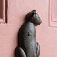 The Seated Cat Antique Iron Coat Hook - 125mm Showing a Close up of the Screw Attachment - Digital Illustration
