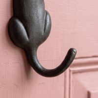 The Seated Cat Antique Iron Coat Hook - 125mm Showing a Close up of the Tail Shaped Hook - Digital Illustration