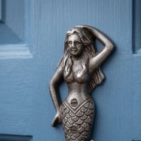 The Siren Mermaid Cast Antique Iron Wall Coat Hook - 145mm Showing a Close up of the Top Half of the Mermaid - Digital Illustration