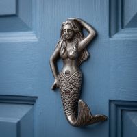 The Siren Mermaid Cast Antique Iron Wall Coat Hook - 145mm Shown on the Back of a Blue Coloured Door - Digital Illustration