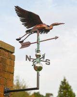 The Soaring Heron Verdigris Copper Weathervane Shown in Full Mounted on a Wall