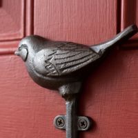 The Songbird Single Cast Iron Coat Hook Showing a Close up of the Bird - Digital Illustration