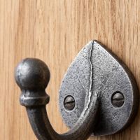 The Spade Backplate Single Wall Hook - 65mm Showing a Close up of the Rounded Hook Tip - Digital Illustration