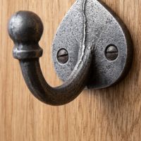 The Spade Backplate Single Wall Hook - 65mm Showing a Close up of the Curved Hook - Digital Illustration