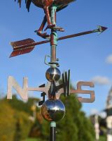 The Striding Rooster Verdigris Copper Weathervane Showing a Close up of the Directional Letters