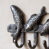 The Swimming Fish 4-Hook Coat Rack in Cast Antique Iron - 170mm Showing a Close up of the Fish - Digital Illustration
