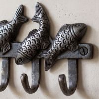 The Swimming Fish 4-Hook Coat Rack in Cast Antique Iron - 170mm Showing a Close up of the Hooks - Digital Illustration