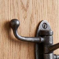 The Swivel Triple Arm Cast Iron Coat Hook 75mm x 100mm Showing a Close up of the Tip of the Upper Hook - Digital Illustration