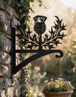 The Thistle Iron Hanging Basket Bracket in the Afternoon Sun on the Side of a Country Cottage - Digital Illustration