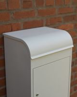 The "Titan" Medium Wall Mounted Parcel Box Steel in Cream Shown from above to See the Curved Lid