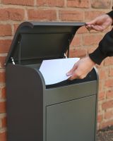 The "Titan" Medium Wall Mounted Parcel Box Steel in Grey Showing a Letter being Delivered whilst Floor Mounted