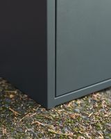 The "Titan" Medium Wall Mounted Parcel Box Steel in Grey Showing the Corner whilst it is Mounted to the Floor