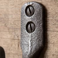 The Yorkshire Single Robe Hook in Cast Antique Iron - 50mm Showing a Close up of the Screw Attachment - Digital Illustration