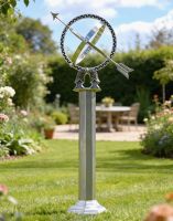 The 105cm Antique Silver Armillary with Column on a Garden Lawn with a Garden Furniture Set in the Background - Digital Illustration The 105cm Antique Silver Armillary with Column on a Garden Lawn with a Garden Furniture Set in the Background - Digital Illustration