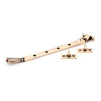 The 10 Inch Polished Bronze Georgian Reeded Casement Window Stay on a White Background 