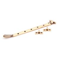 The 12 Inch Polished Bronze Georgian Reeded Casement Window Stay on a White Background 