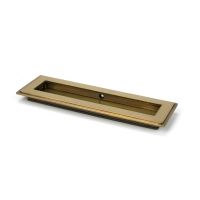 The 175mm Art Deco Rectangular Flush Pull Handle in Aged Brass Shown at an Angle on a White Background