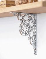 The 17cm x 13cm "Harrison" Chrome Shelf Bracket Mounted on a White Interior Kitchen Wall - Digital Illustration The 17cm x 13cm "Harrison" Chrome Shelf Bracket Mounted on a White Interior Kitchen Wall - Digital Illustration
