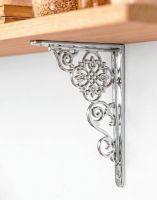 The 17cm x 13cm "Pittsburgh" Bright Chrome Shelf Bracket Mounted on a White Coloured Modern Kitchen Wall - Digital Illustration 