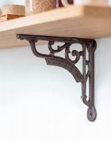 The 18 x 20cm "J Duckett & Son" Iron Bracket Used to Mount a Wooden Shelf on a White Modern Kitchen Wall - Digital Illustration
