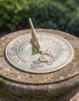 The 190mm Polished Brass Hummingbird Sundial Fitted on a Stone Garden Pillar - Digital Illustration The 190mm Polished Brass Hummingbird Sundial Fitted on a Stone Garden Pillar - Digital Illustration