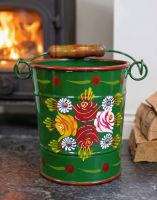 The 19cm Medium Green Narrowboat Hand Painted Bucket in Front of a lit Log Burner Stove in a White Living Room - Digital Illustration The 19cm Medium Green Narrowboat Hand Painted Bucket in Front of a lit Log Burner Stove in a White Living Room - Digital Illustration