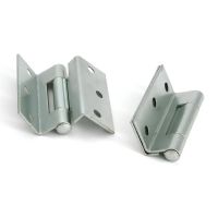 A Pair of Stormproof Hinges in Three Finishes