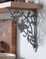 The 20 x 21cm Flowers and Vines Iron Shelf Bracket Mounted in a Contemporary White Tiled Kitchen - Digital Illustration The 20 x 21cm Flowers and Vines Iron Shelf Bracket Mounted in a Contemporary White Tiled Kitchen - Digital Illustration