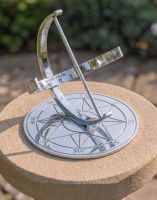 The 20cm "Zenith" Bright Chrome Armillary on a Round Stone Pillar in a Country Garden - Digital Illustration 