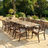 The "Attingham Grand" 12-Seater Outdoor Dining Set - Antique Copper Digital Illustration Dressed Table