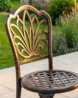 The "Charlotte" 2-Seater Outdoor Mosaic Bistro Set - Antique Bronze digital illustration chair close up