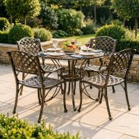 The "Chigwell" Circular 4-Seater Garden Dining Set - Brushed Gold Digital Illustration Dressed table The "Chigwell" Circular 4-Seater Garden Dining Set - Brushed Gold Digital Illustration Dressed table
