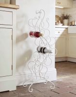 The "Dickory Cottage" Vintage Style Free Standing Wine Rack Placed on a Trafitional Stone Tile Floor in a Cottage Kitchen - Digital Illustration
