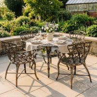 The "Edworth Manor" 4-Seater Outdoor Dining Set - Brushed Gold Digital Illustration Dressed table The "Edworth Manor" 4-Seater Outdoor Dining Set - Brushed Gold Digital Illustration Dressed table